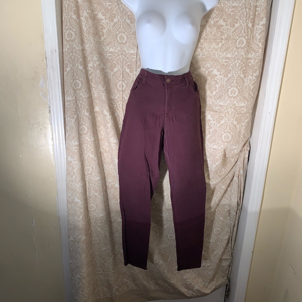 Women wine color jeans.